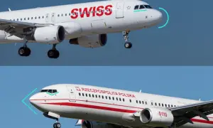 Zwei Flugzeuge, ein Airbus der Swiss und ein Boeing-Langstreckenflugzeug der polnischen Luftwaffe, fliegen nebeneinander.